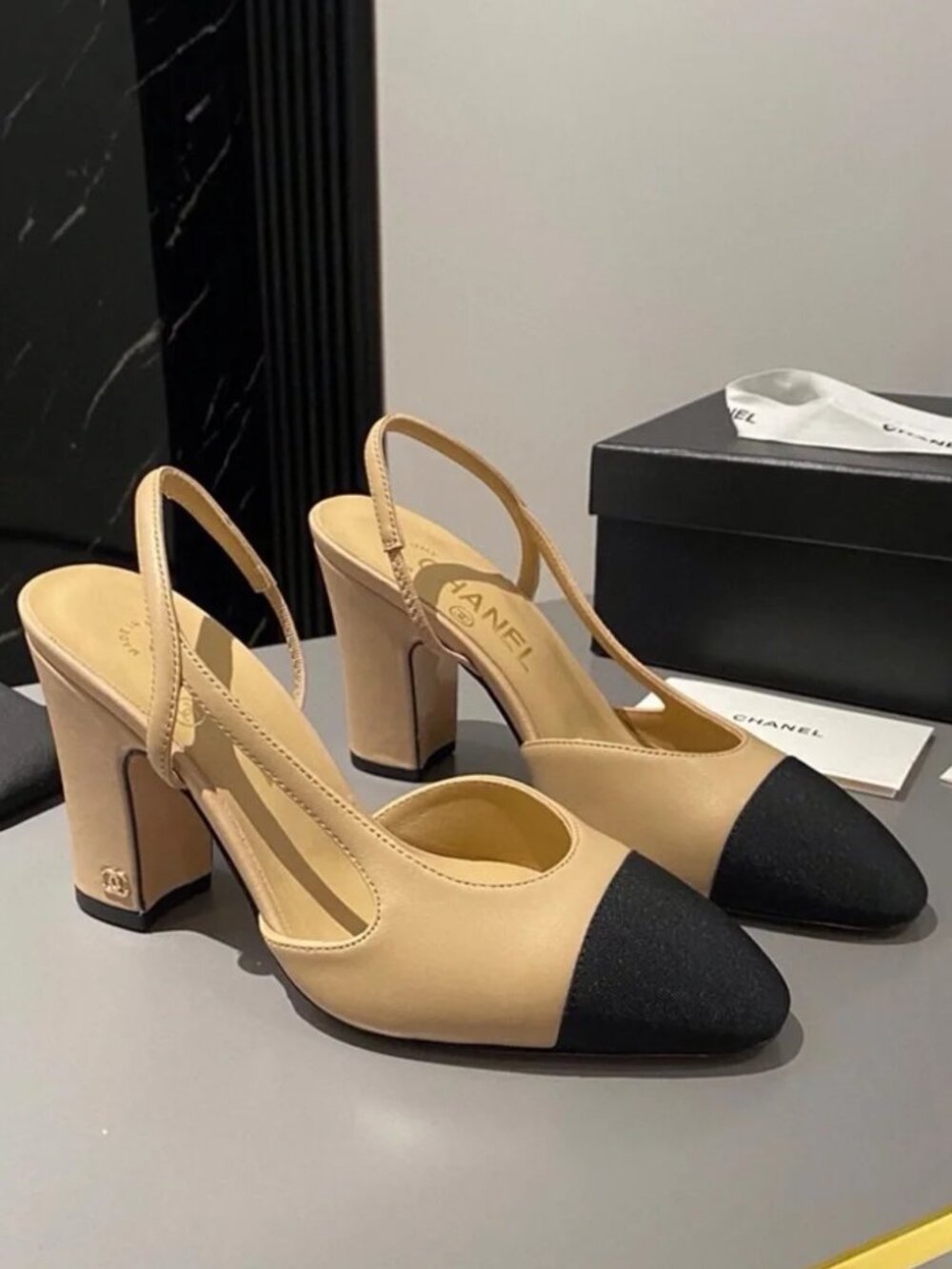CHANEL Beige Leather Slingback Pumps with Black Cap Toe
